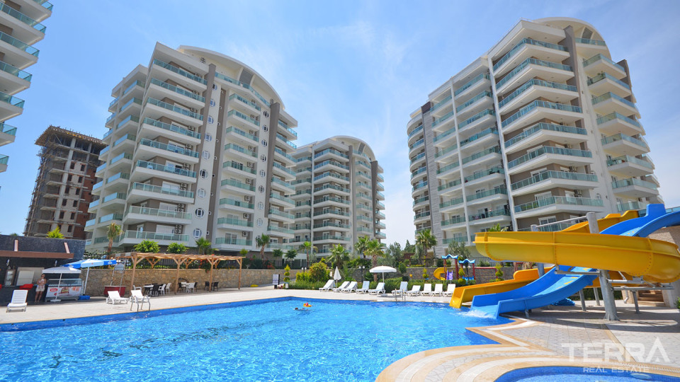 Joyful Living at Renowned Crown City with Bargain Alanya Apartment